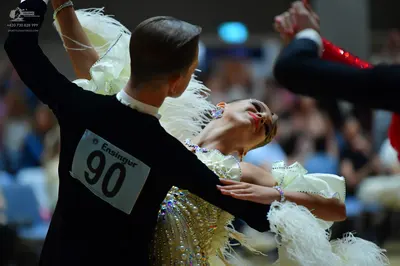 Dancesport competitor #90: Male dancer: black long-sleeved top