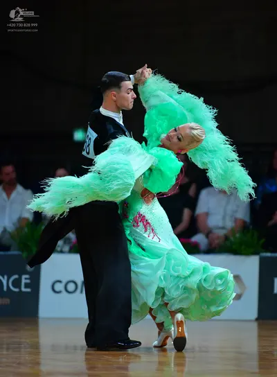 Dancesport competitor #68: Male dancer: black long-sleeved dance shirt and black trousers