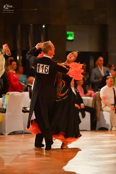 Dancesport competitor #116: Male dancer: black ballroom tailcoat