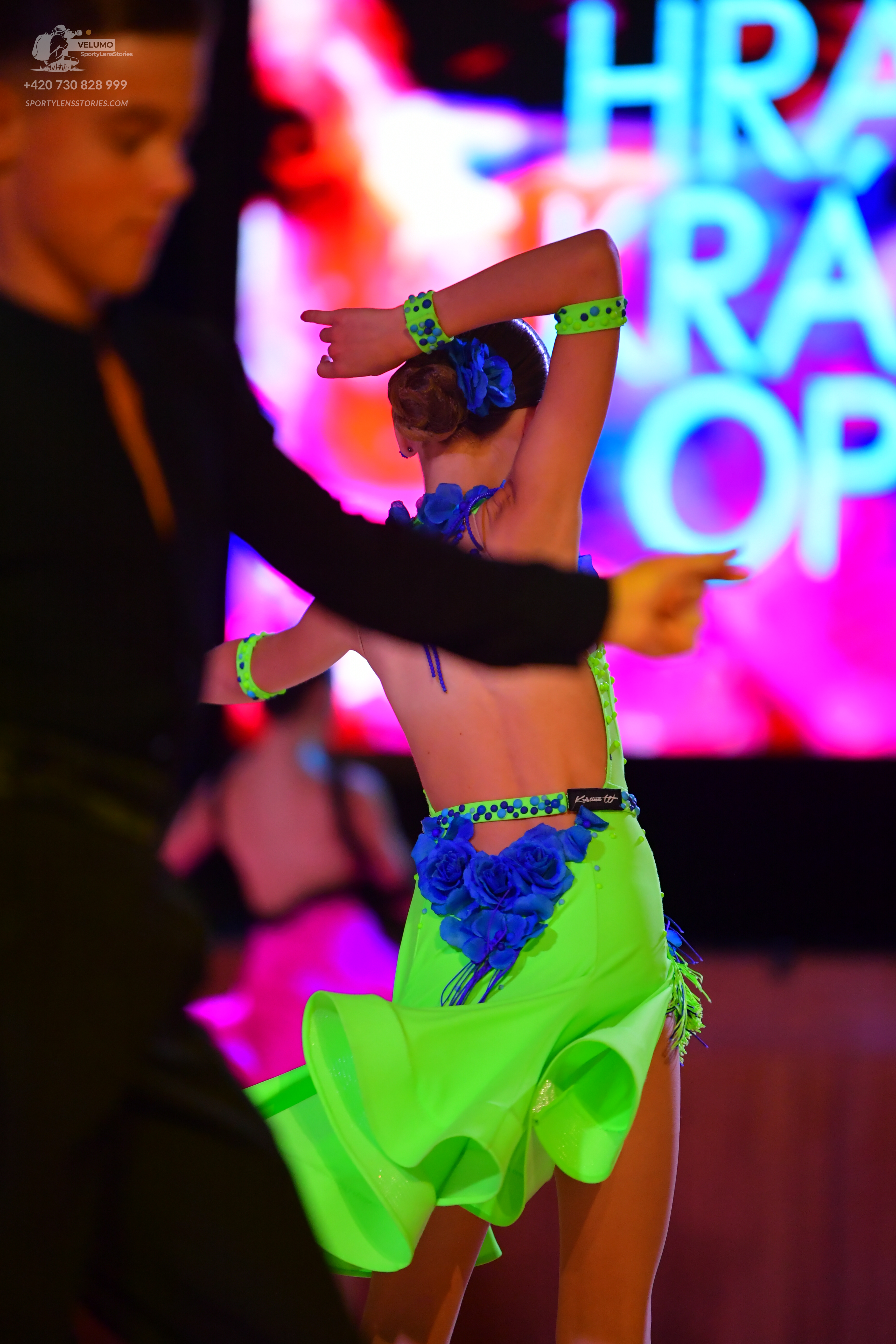 Dancesport competitor: Male dancer: black long-sleeved shirt or suit