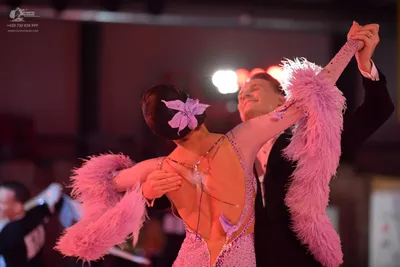 Dancesport competitor: Male dancer: black suit