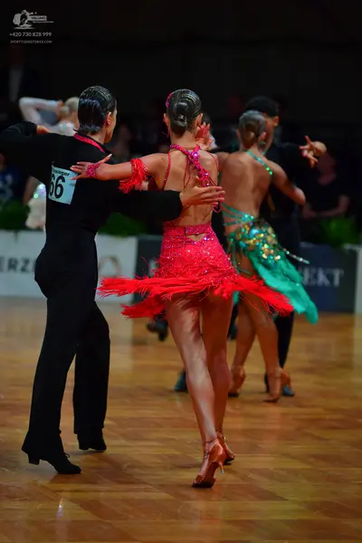 Dancesport competitor #66: Male dancer: black shirt and trousers