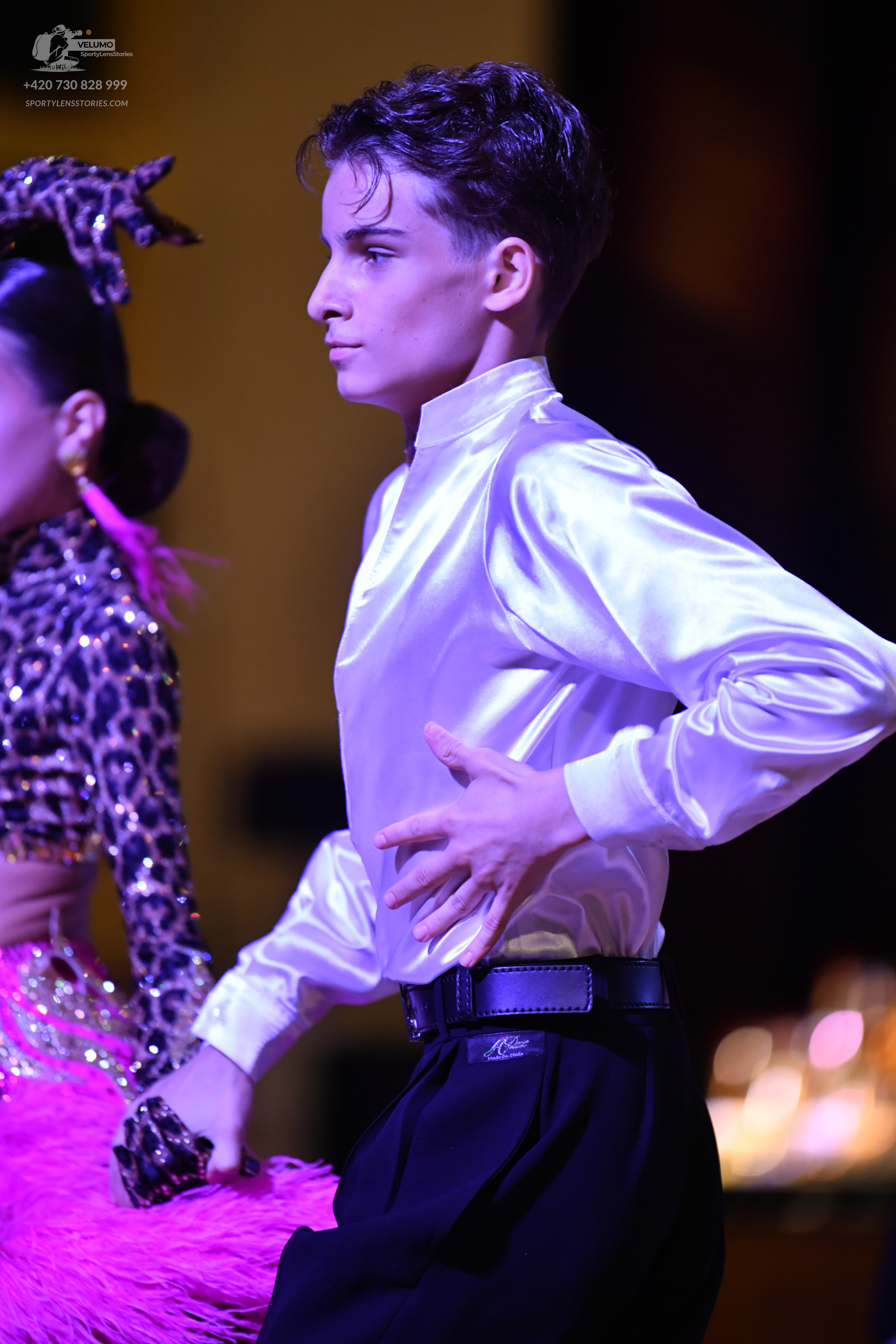 Dancesport competitor: Male**

*   **Color:** White
*   **Fabric:** Satin (likely with a subtle sheen)
