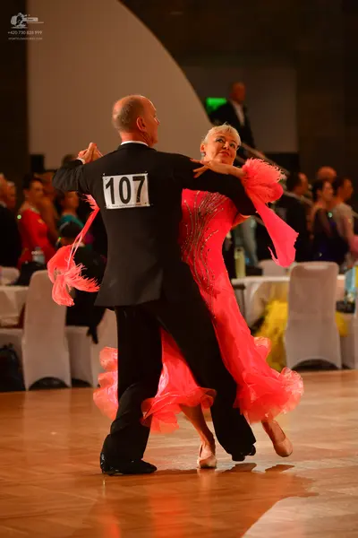 Dancesport competitor #107: Male dancer: black suit