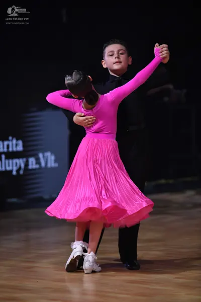 Dancesport competitor: Male dancer: black suit