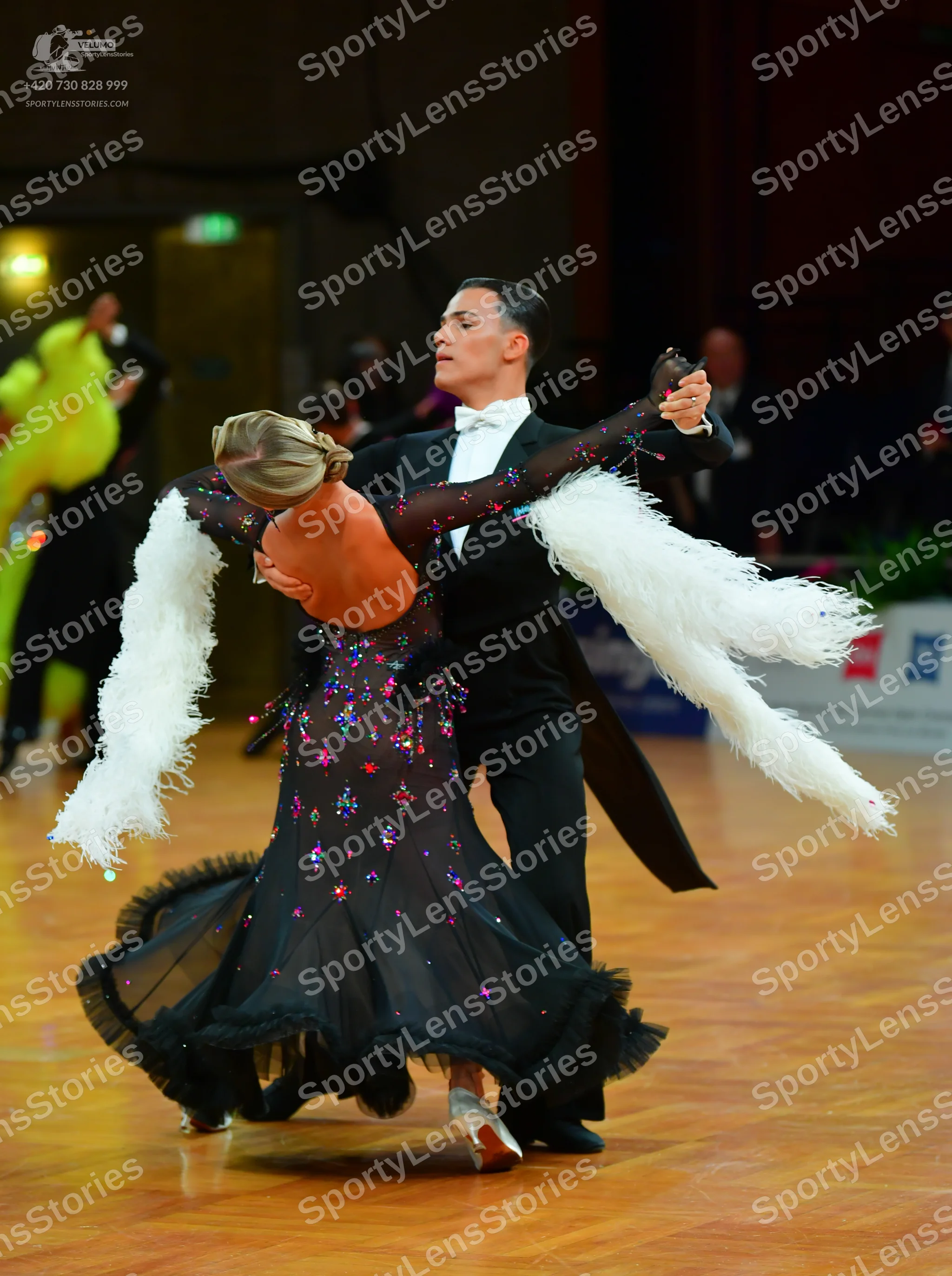 Dancesport competitor: Male dancer: black tailcoat suit with a white shirt and white bowtie