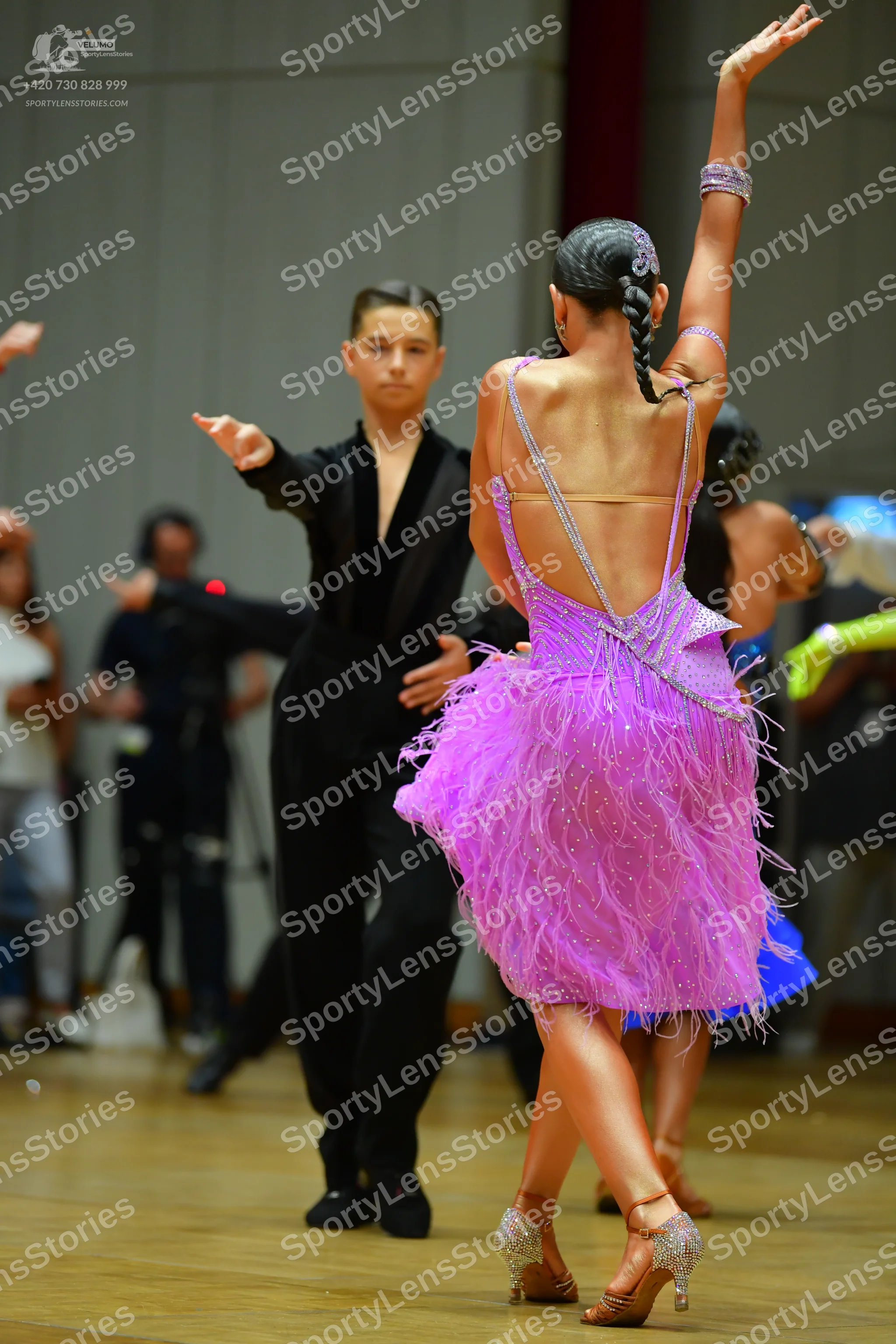 Dancesport competitor: Male dancer: black suit