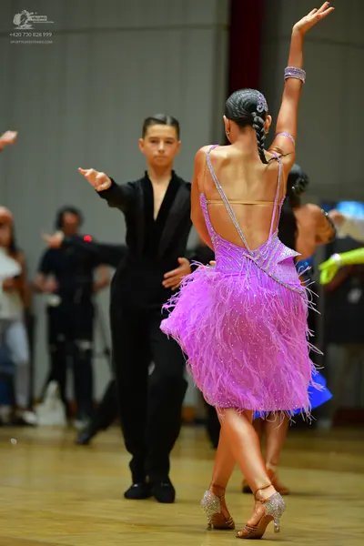 Dancesport competitor: Male dancer: black suit