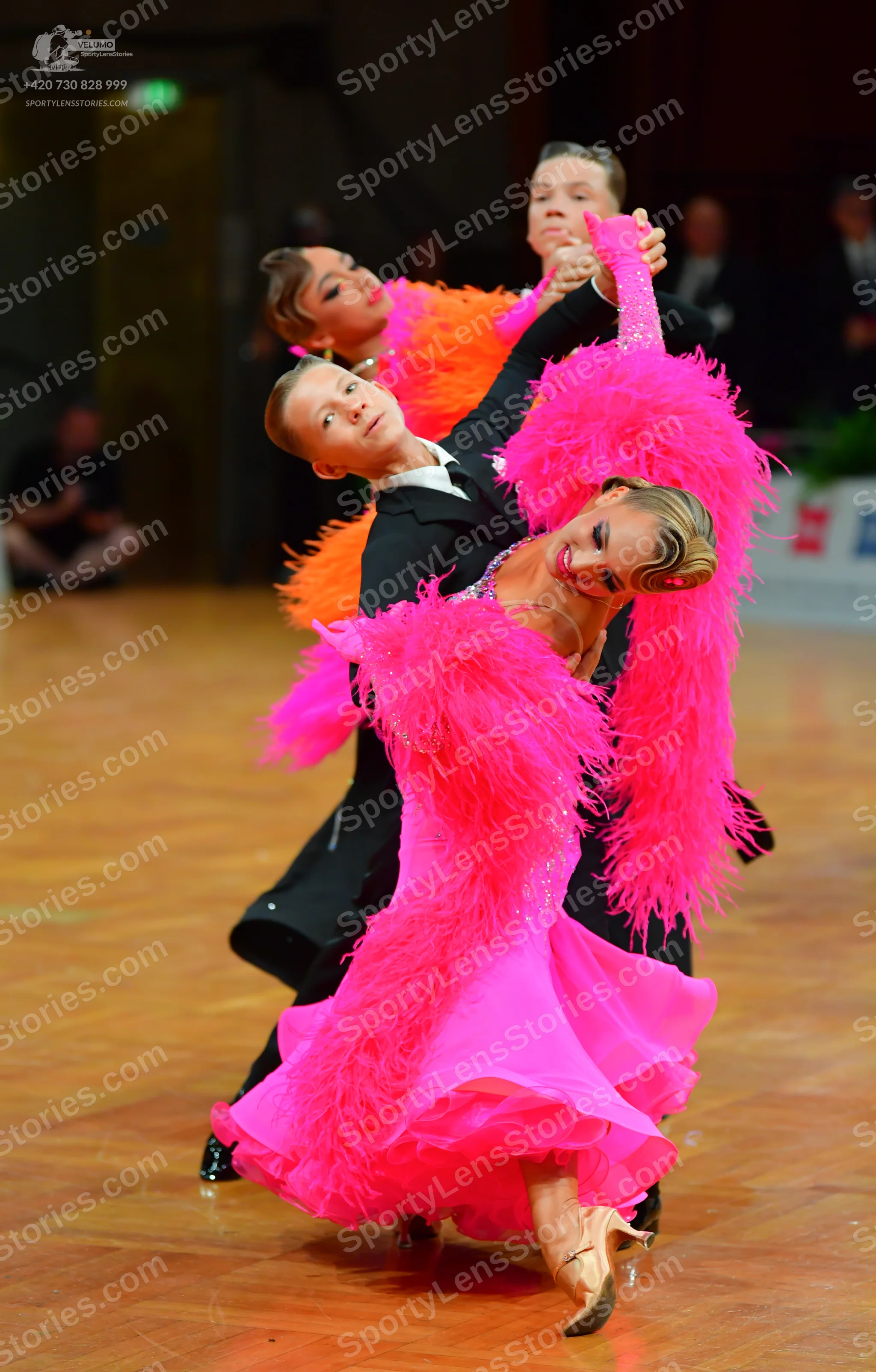 Dancesport competitor: Male dancer: black suit and white shirt