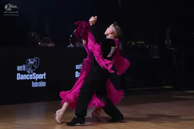 Dancesport competitor: Male dancer: black dance trousers and shirt