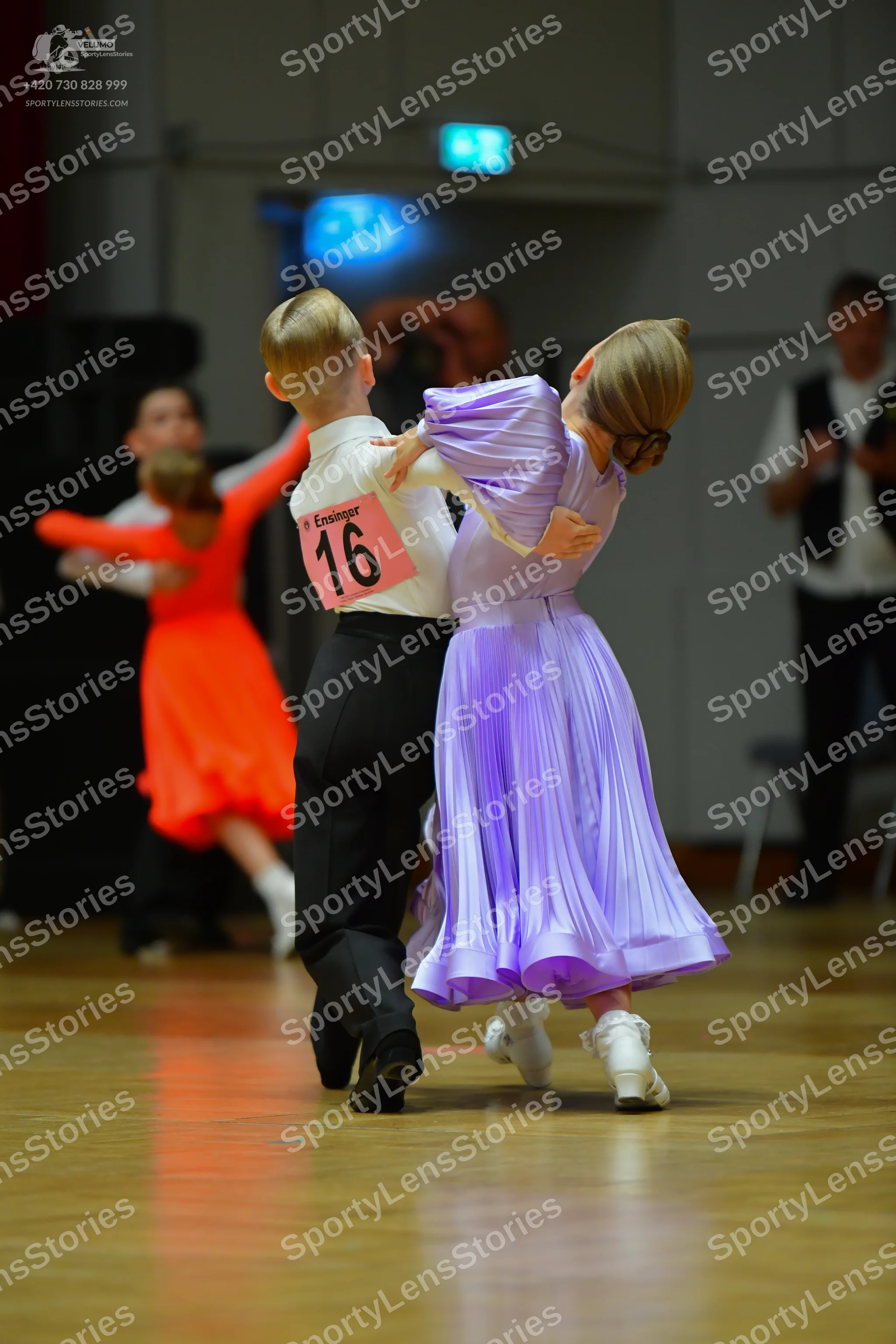 Dancesport competitor #16: Male dancer: white shirt and black trousers