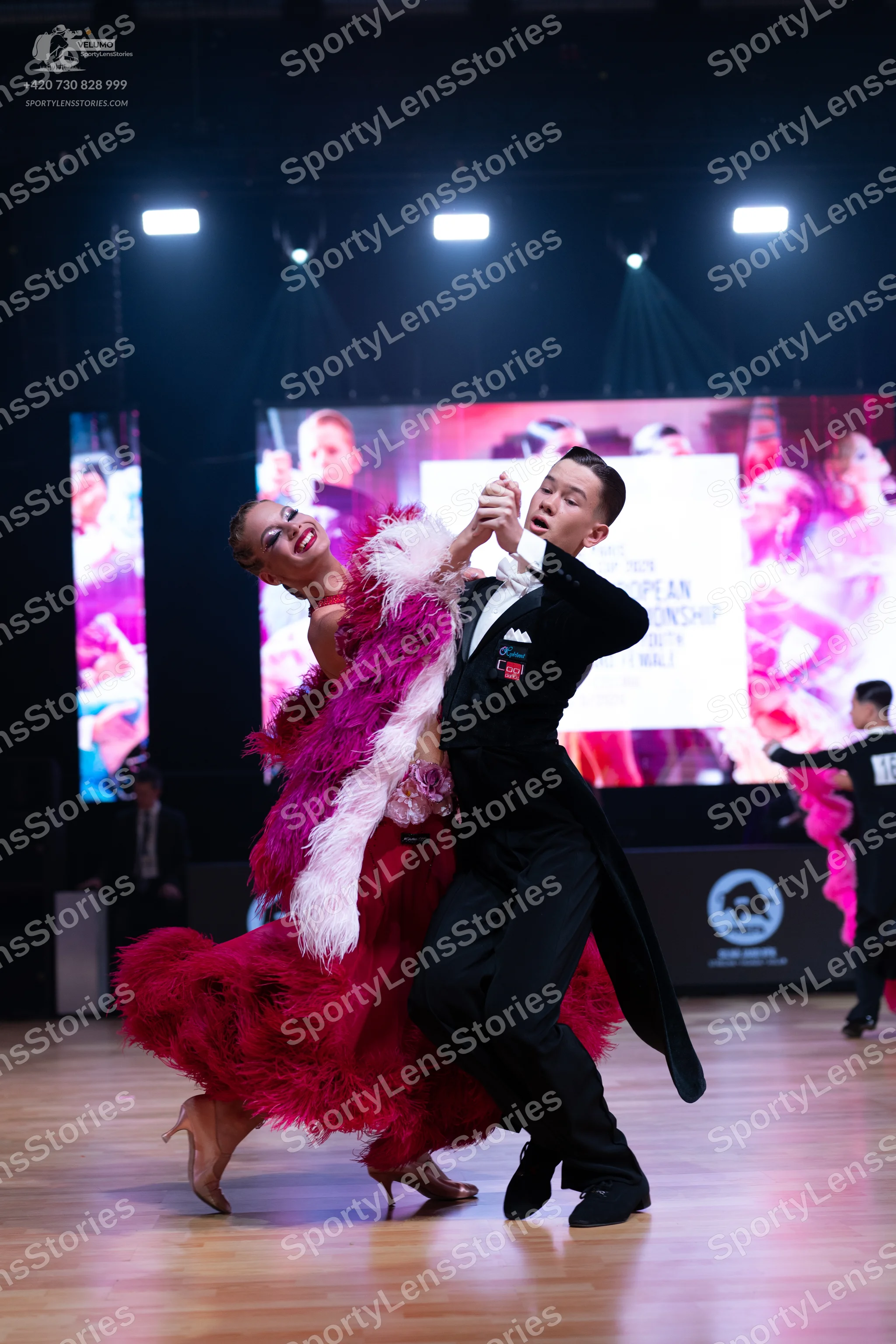 Dancesport competitor: Male dancer: black tailcoat suit with white shirt and black trousers