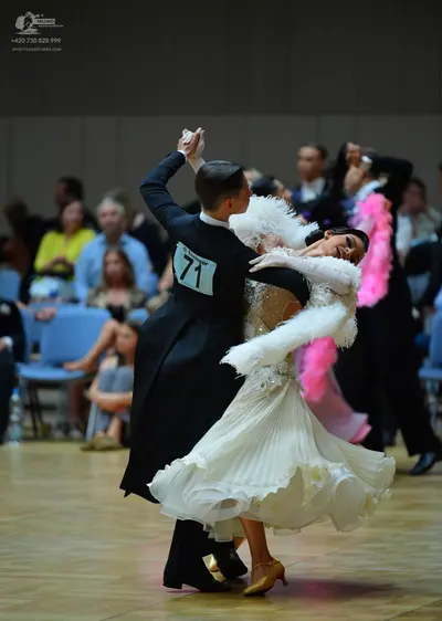 Dancesport competitor #71: Male dancer: black ballroom tailcoat