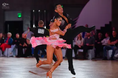 Dancesport competitor #102: Male dancer: black latin dance shirt with sequins and black trousers