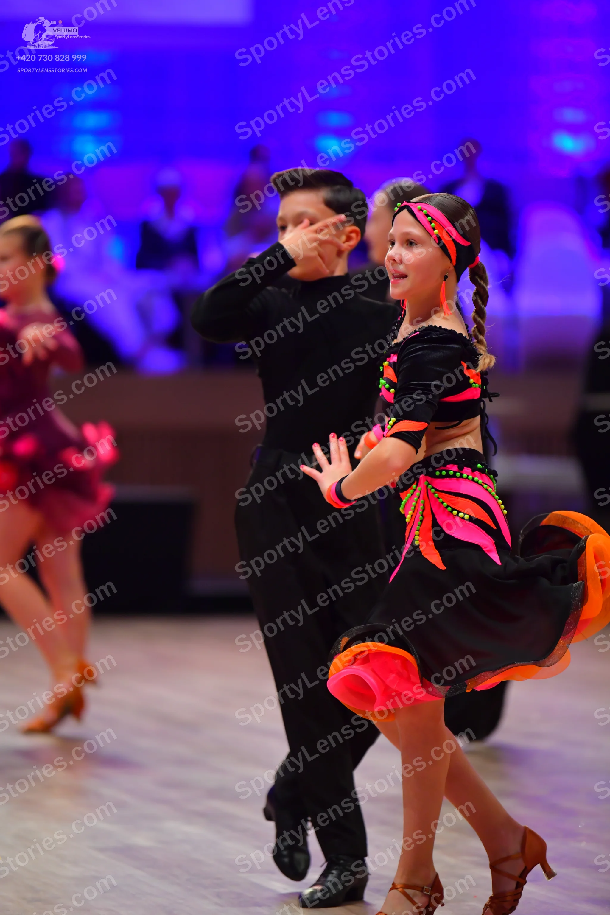 Dancesport competitor: Male dancer: black long-sleeved shirt and black trousers