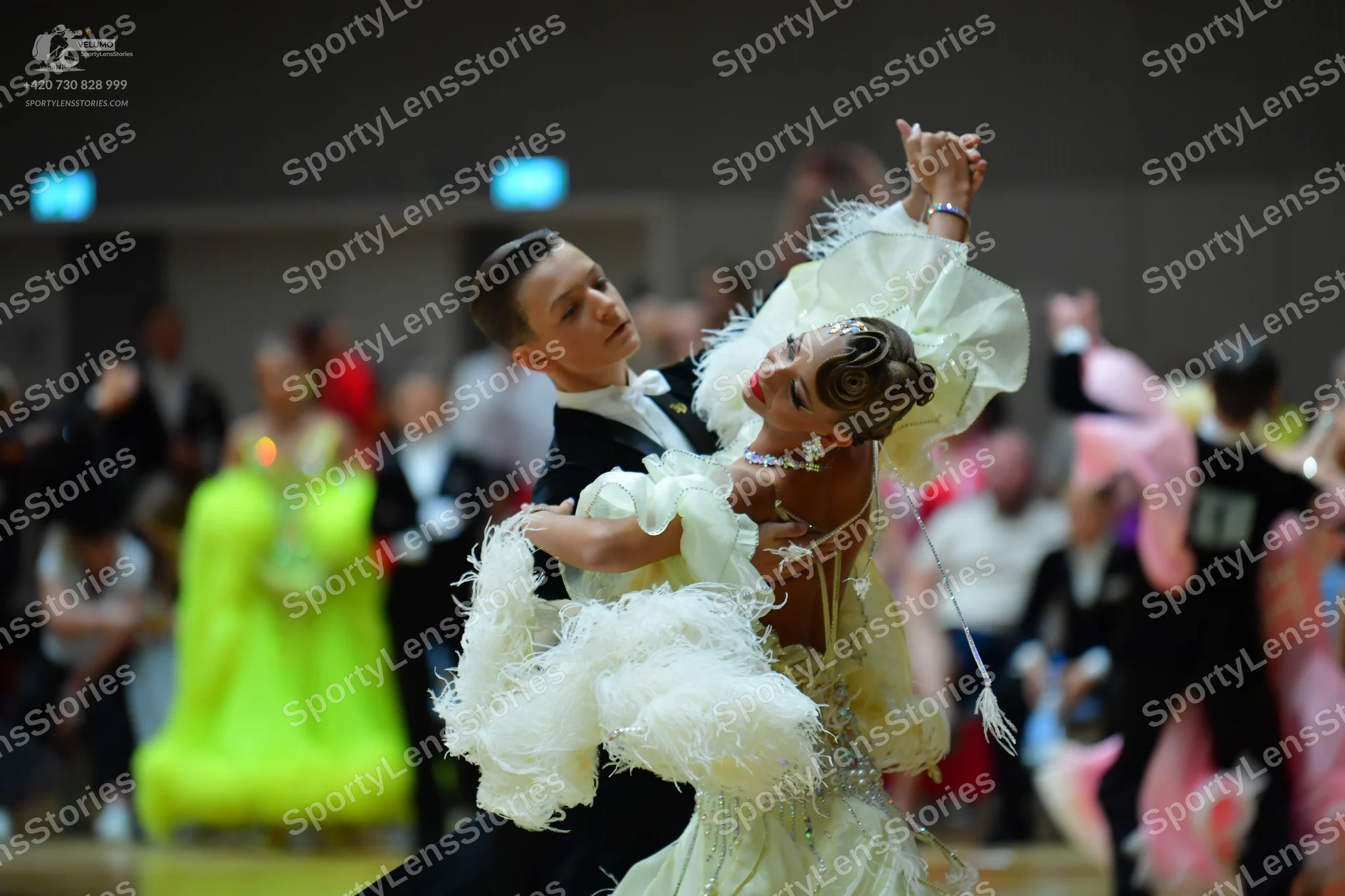Dancesport competitor: Male dancer: black formal dance suit with a white shirt