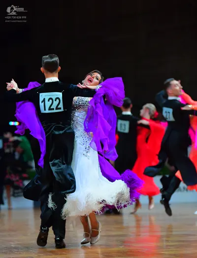 Dancesport competitor #122, #83: Male dancer 1: black suit