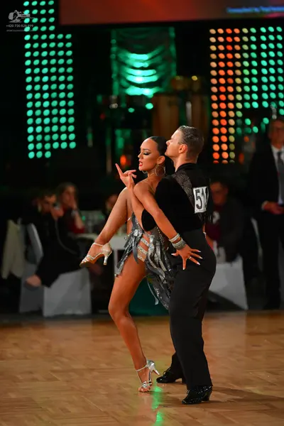 Dancesport competitor #516: Male dancer: black dance shirt and black trousers