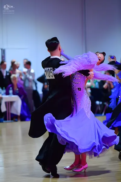 Dancesport competitor #105: Male dancer: black suit