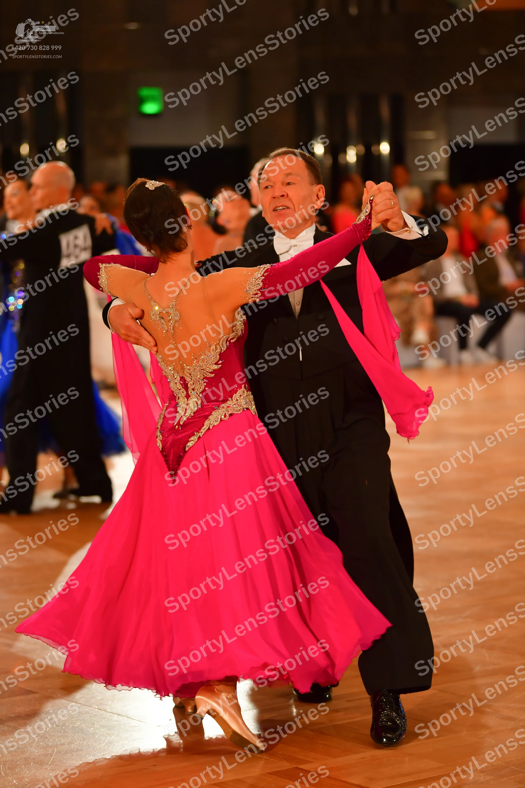 Dancesport competitor #234: Male dancer (left): black suit