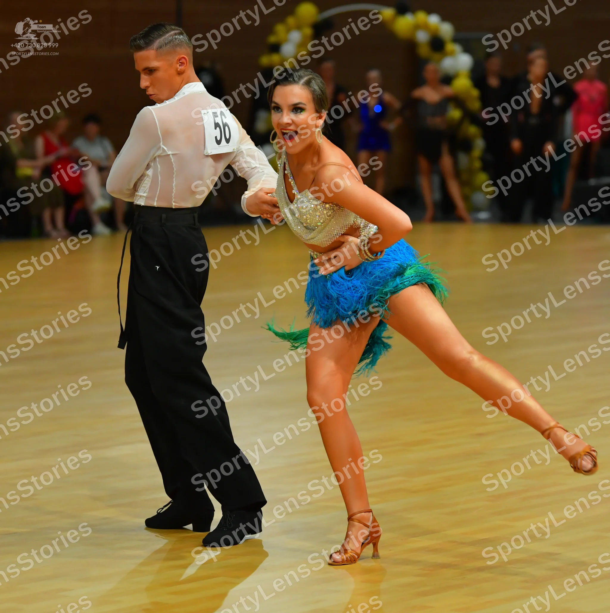 Dancesport competitor #56: Male dancer: white long-sleeved shirt and black trousers