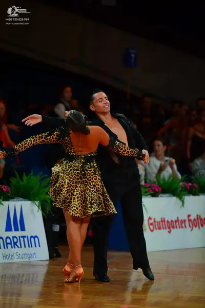 Dancesport competitor: Male dancer: black shirt and black trousers