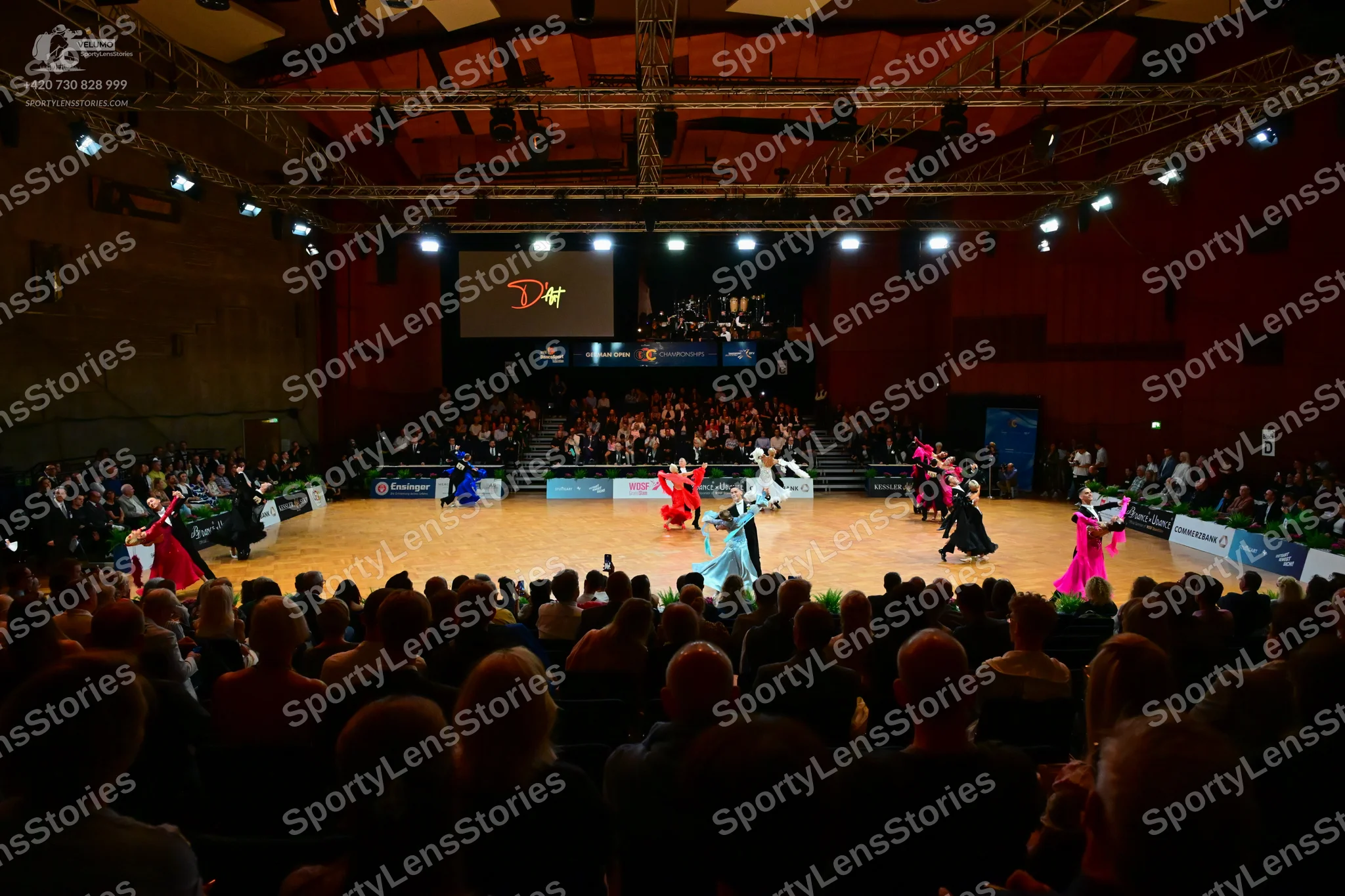 Dancesport competitor: Female dancer: bright red latin-style dress