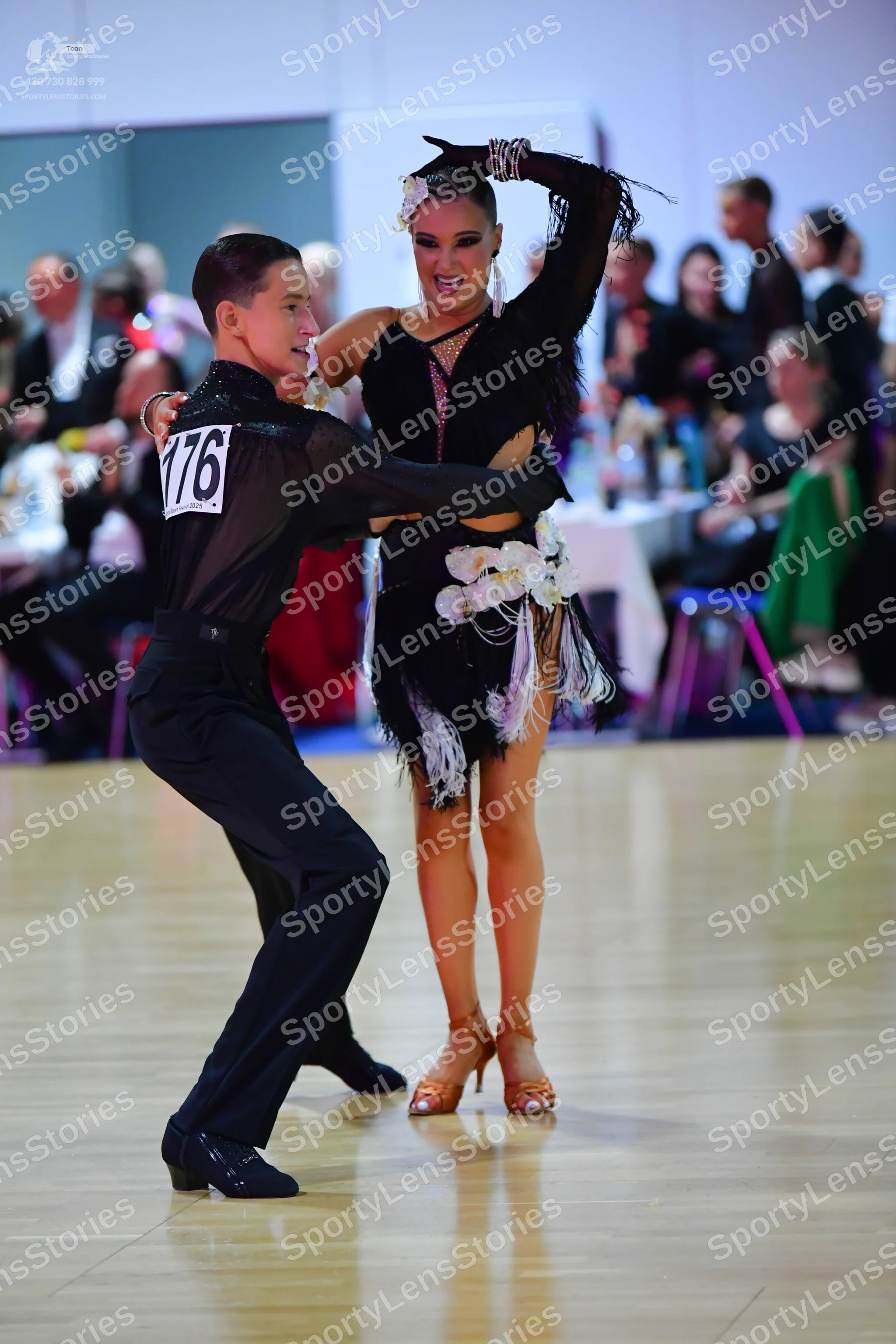 Dancesport competitor #176: Male dancer: black long-sleeved dance shirt and black trousers