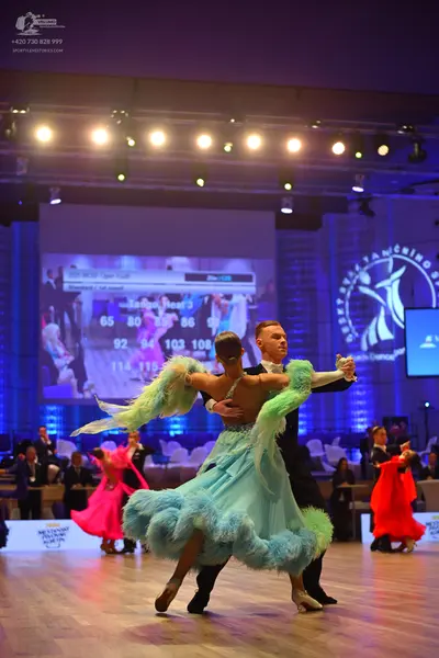 Dancesport competitor: Male dancer: black suit