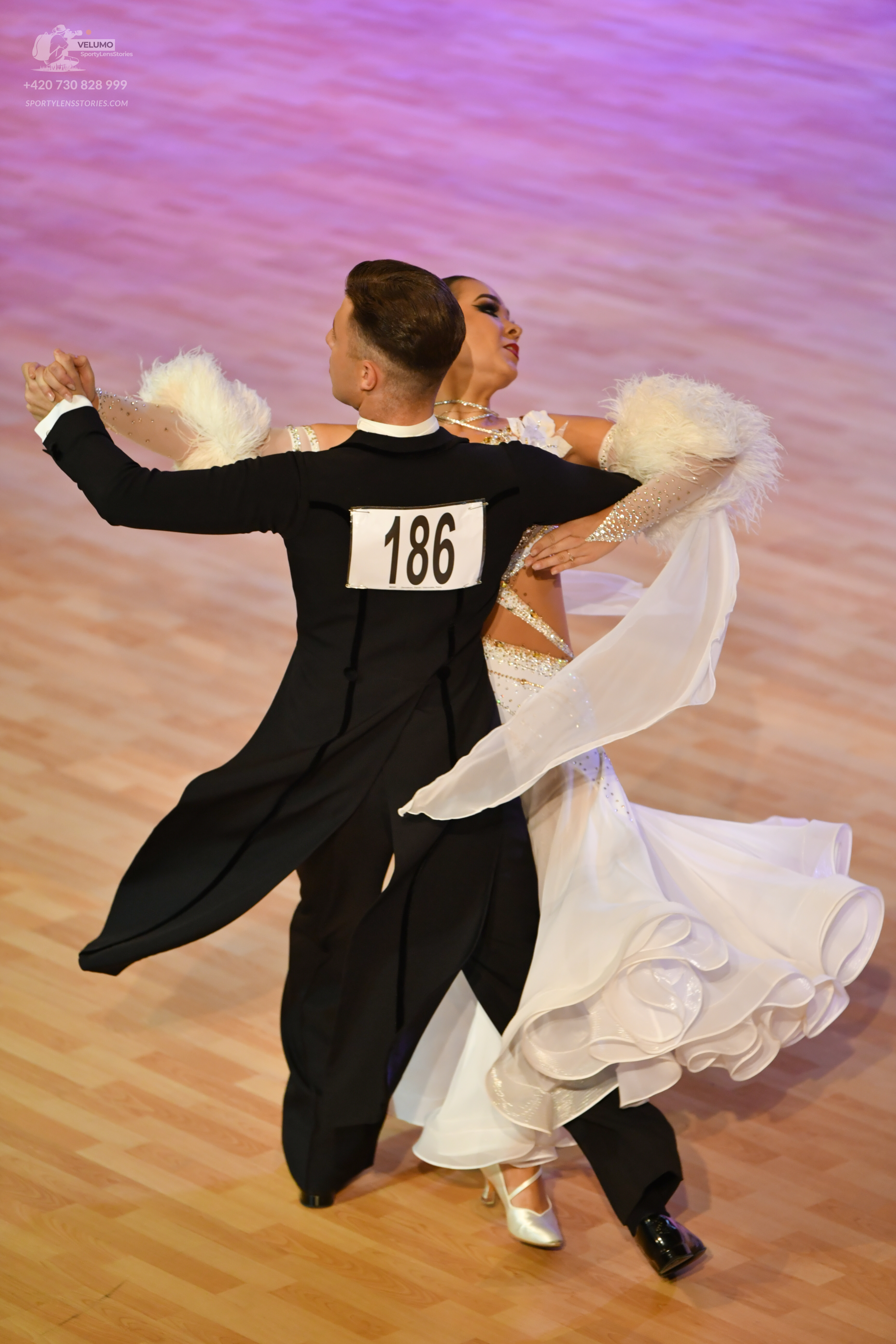 Dancesport competitor: ** Black tailsuit