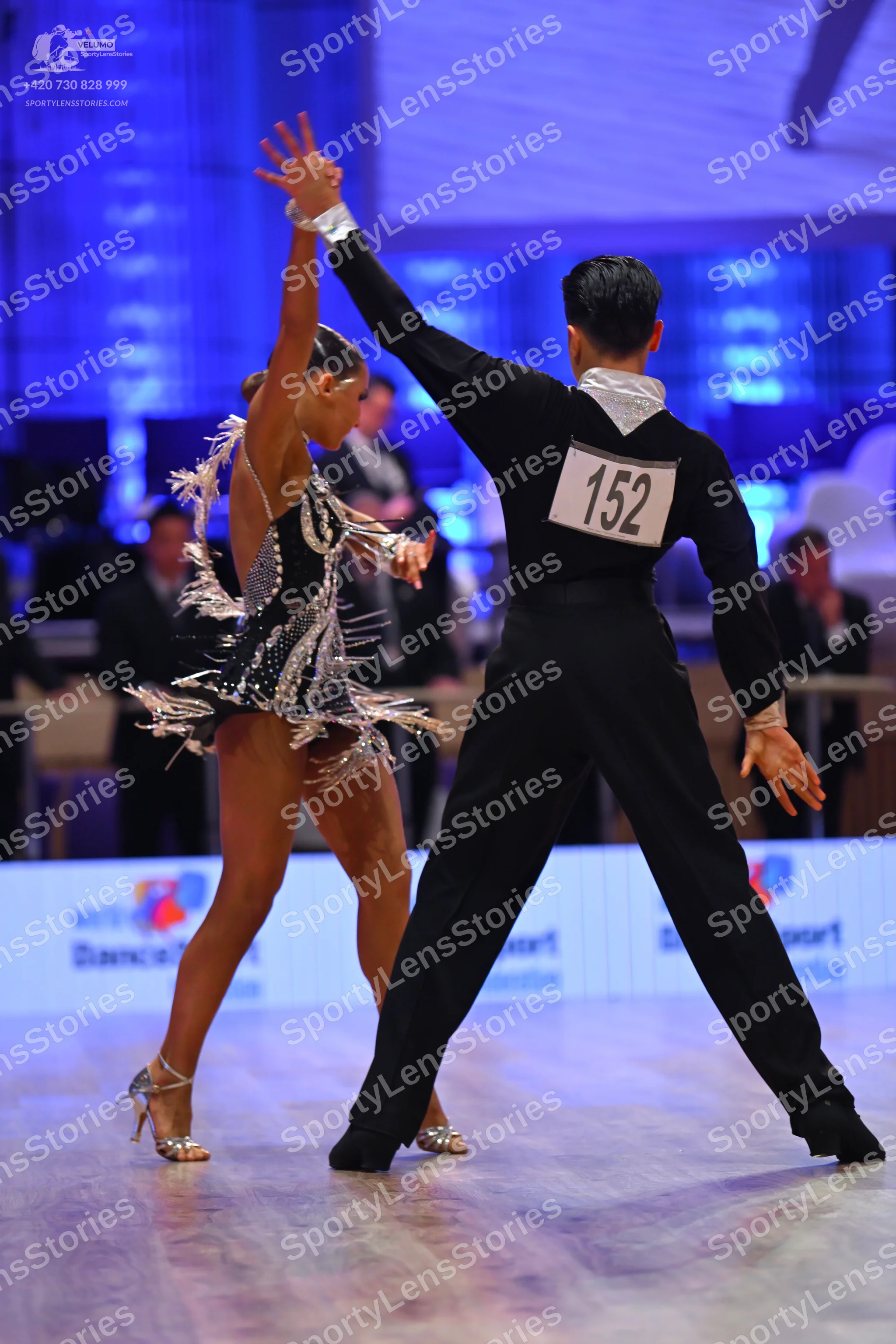 Dancesport competitor: Male dancer: black long-sleeved shirt and black trousers