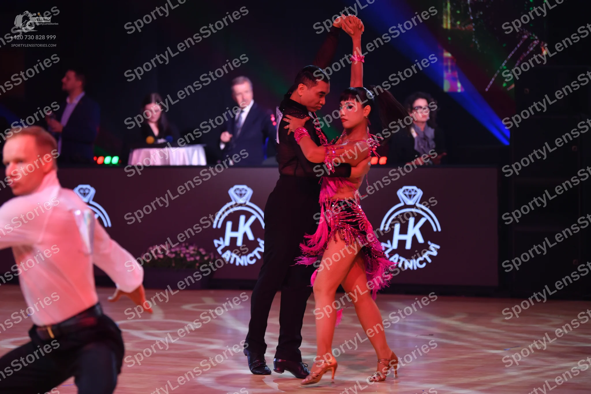 Dancesport competitor: Male dancer 1: white shirt and black trousers