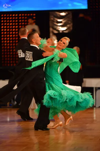 Dancesport competitor #591, #630: Male dancer: black ballroom suit with white shirt
