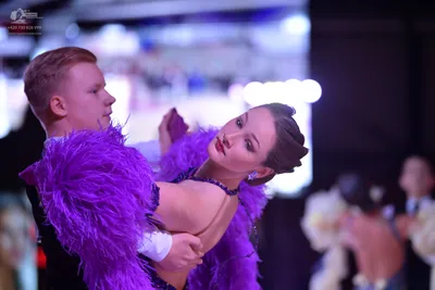 Dancesport competitor: Male dancer: black suit