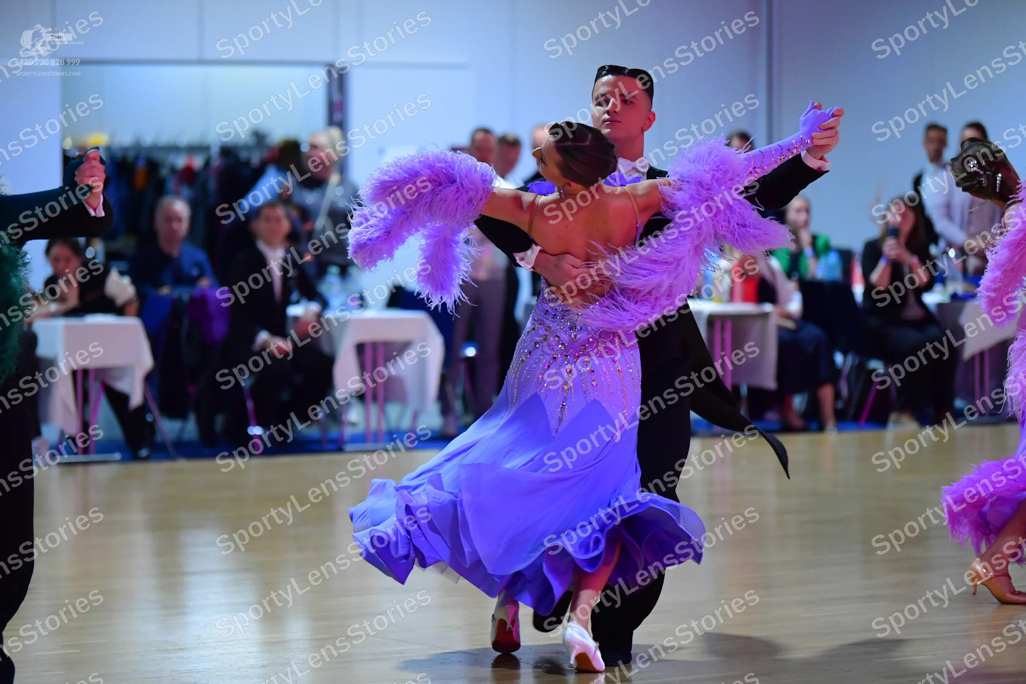 Dancesport competitor: Male dancer: black suit