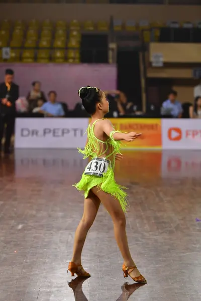 Dancesport competitor #430: Female dancer: lime green latin dress with fringe