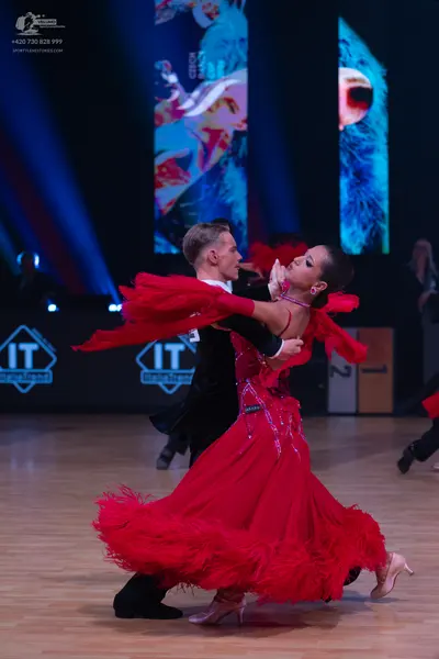 Dancesport competitor: Male dancer: black suit