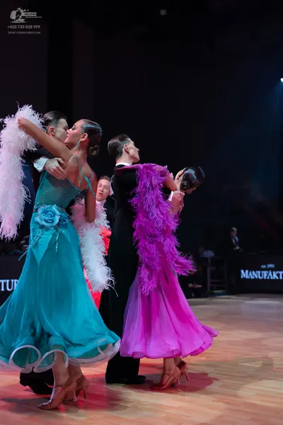 Dancesport competitor: Male dancers: black suits