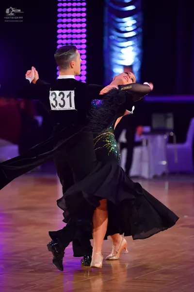 Dancesport competitor #331: Male dancer: black suit