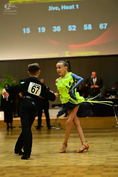 Dancesport competitor #67: Male dancer: black long-sleeved shirt and black trousers