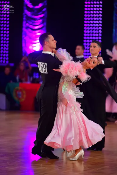 Dancesport competitor #169: Male dancer: black suit
