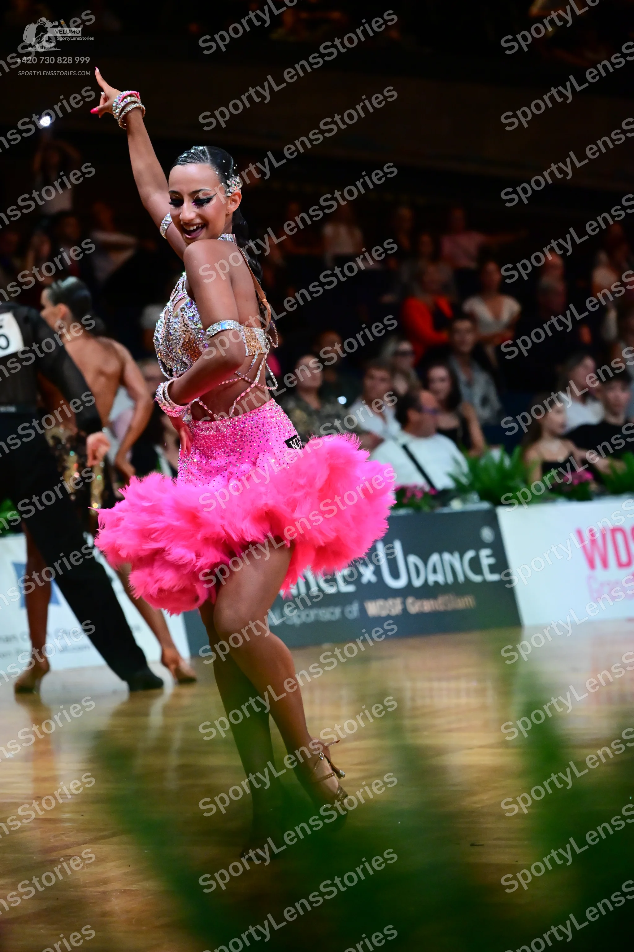 Dancesport competitor: Male dancer: black long-sleeved shirt and black trousers