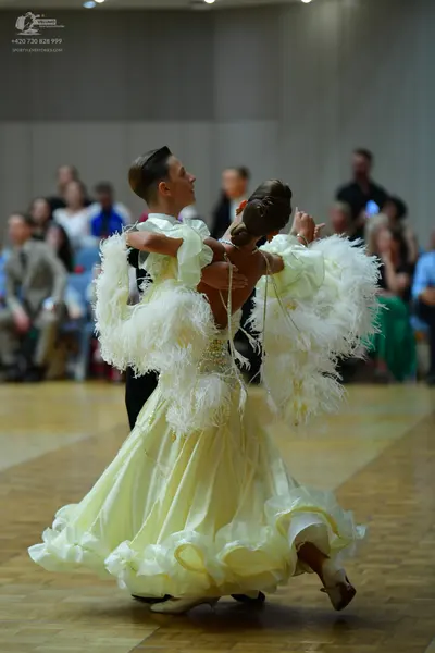 Dancesport competitor: Male dancer: black formal dance attire