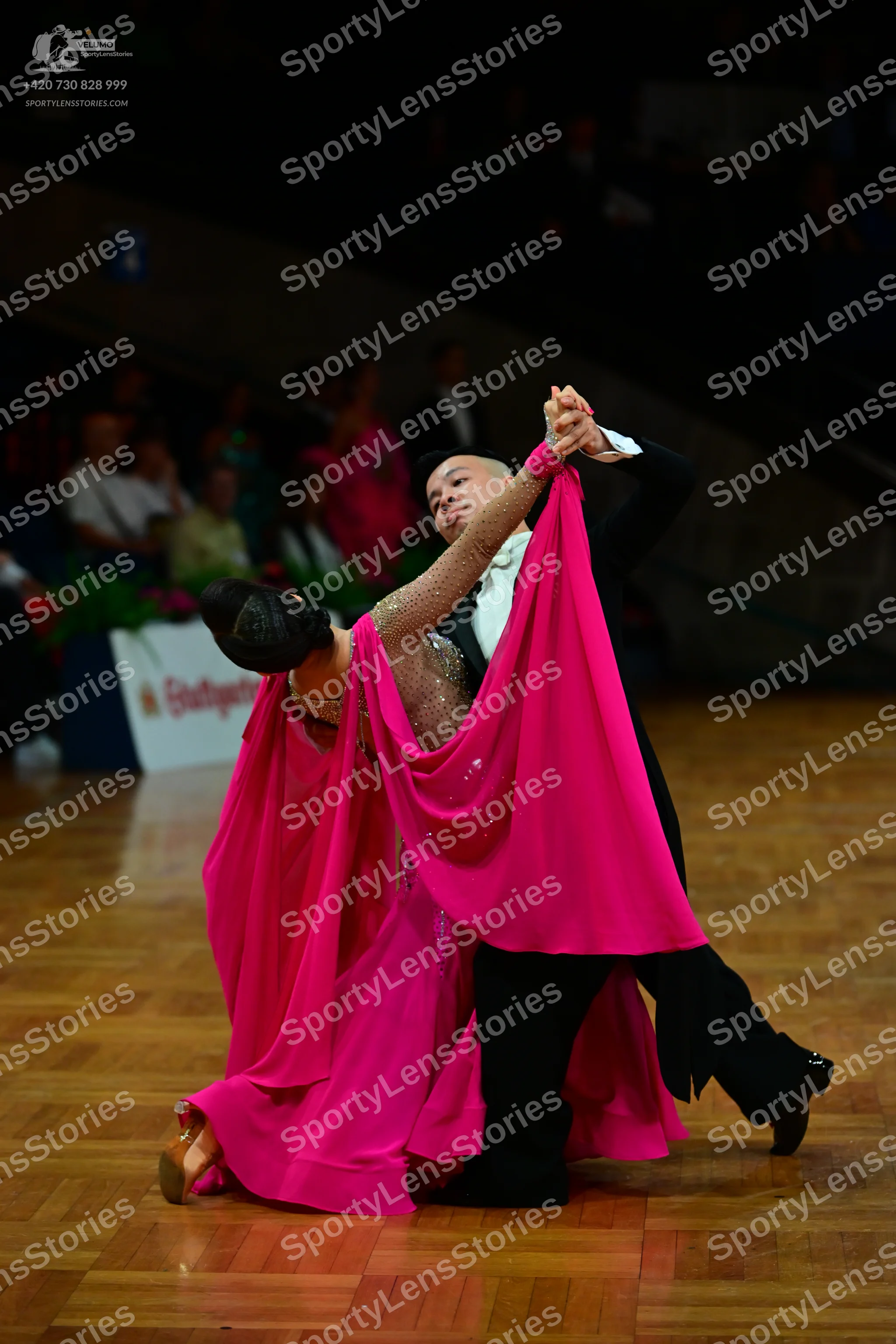 Dancesport competitor: Male dancer: black suit with a white shirt and black bow tie