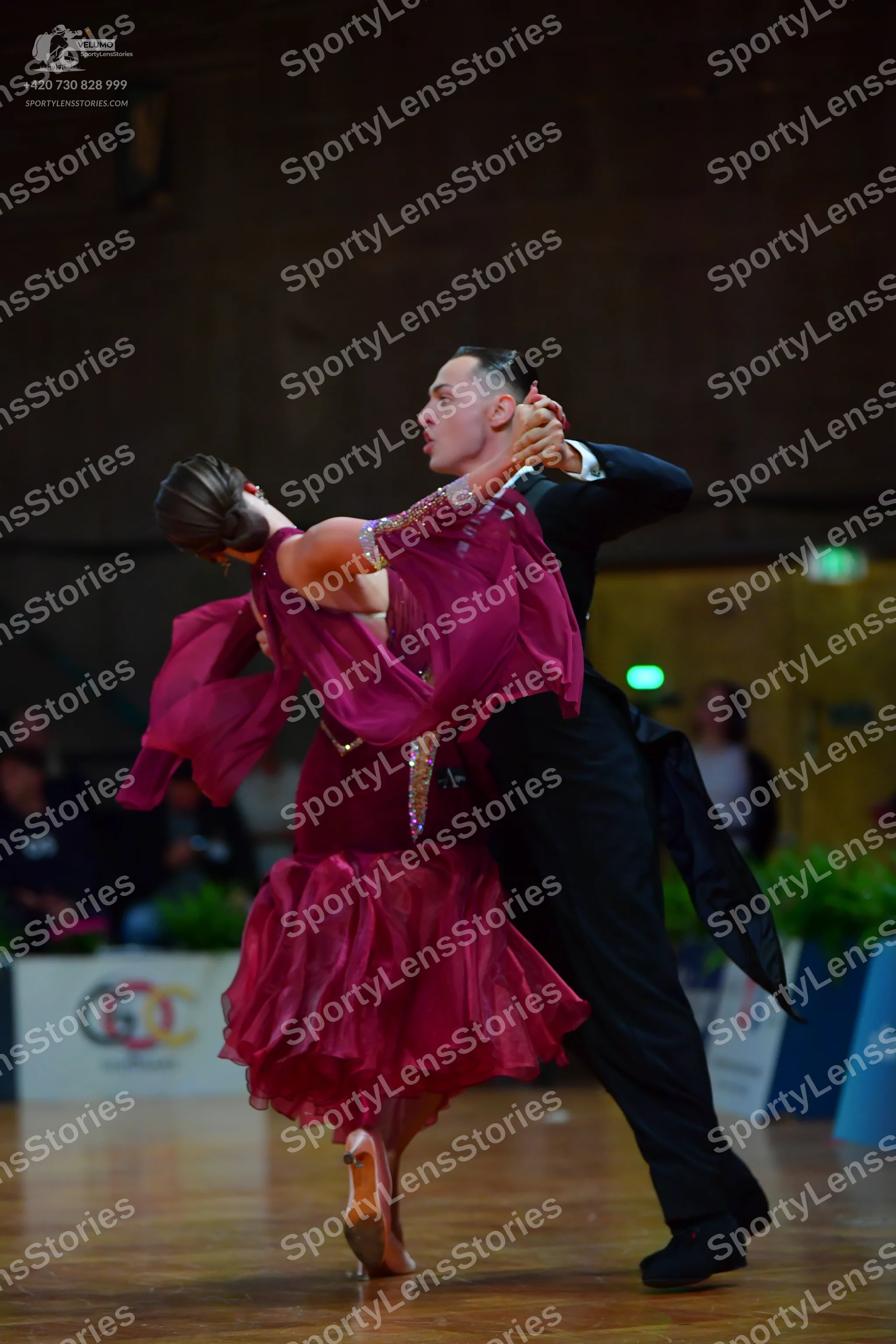 Dancesport competitor: Male dancer: black suit with a white shirt and black bowtie