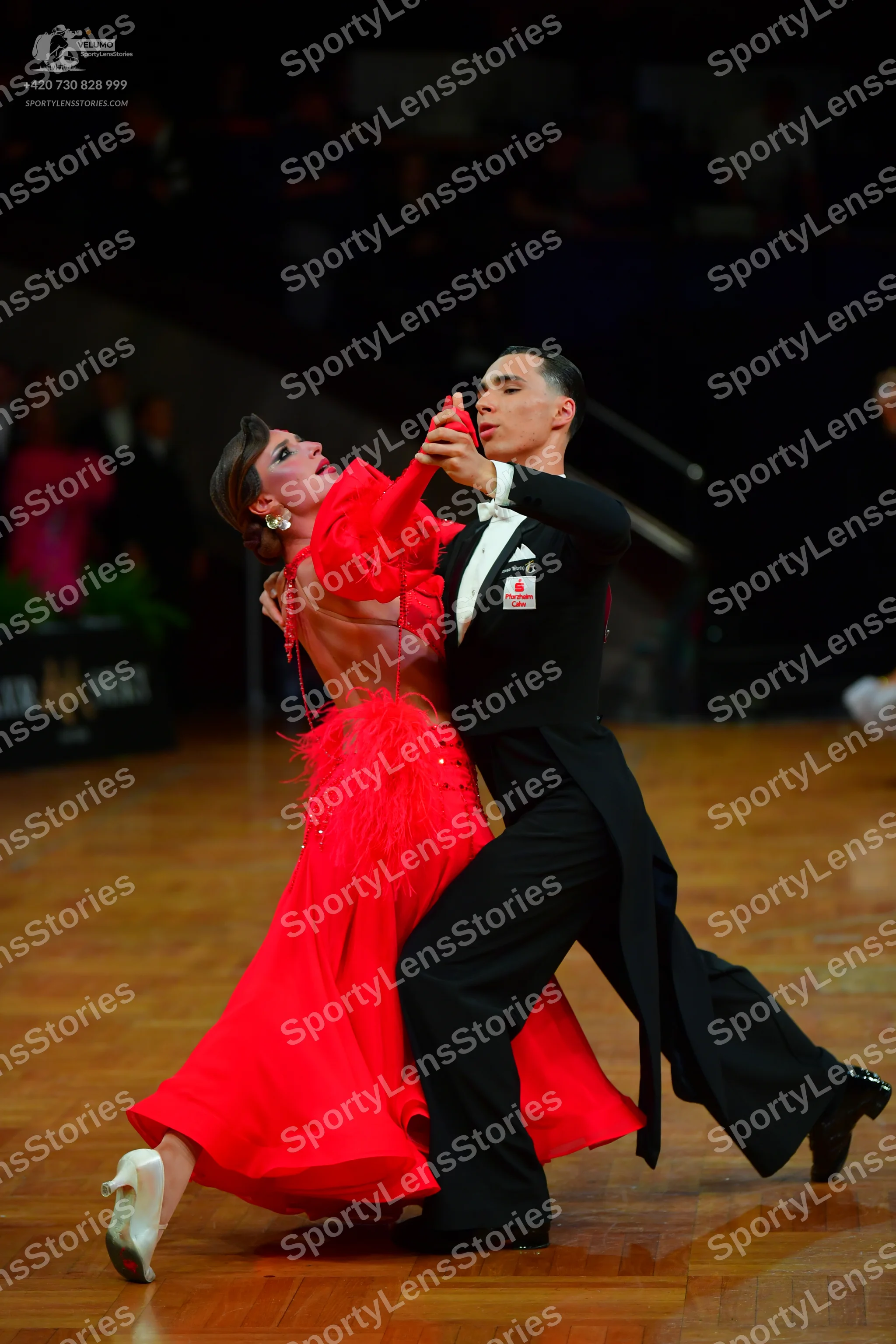 Dancesport competitor: Male dancer: black tailcoat suit with a white collar and black bowtie