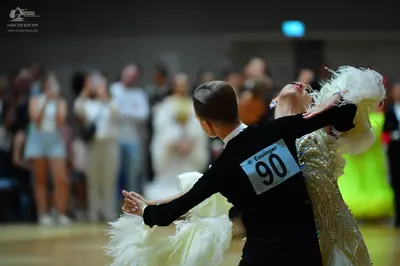 Dancesport competitor #90: Male dancer: black long-sleeved top
