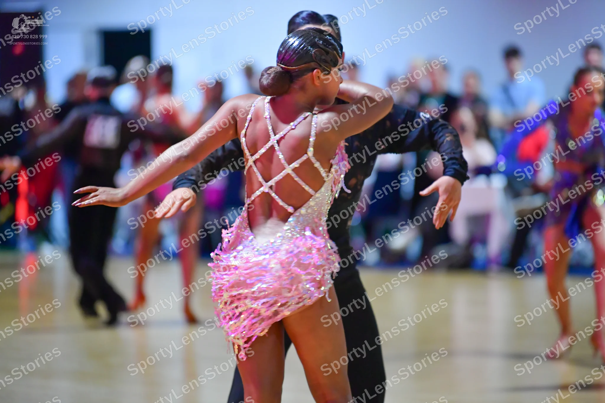 Dancesport competitor: Male dancer: black long-sleeved shirt and black trousers