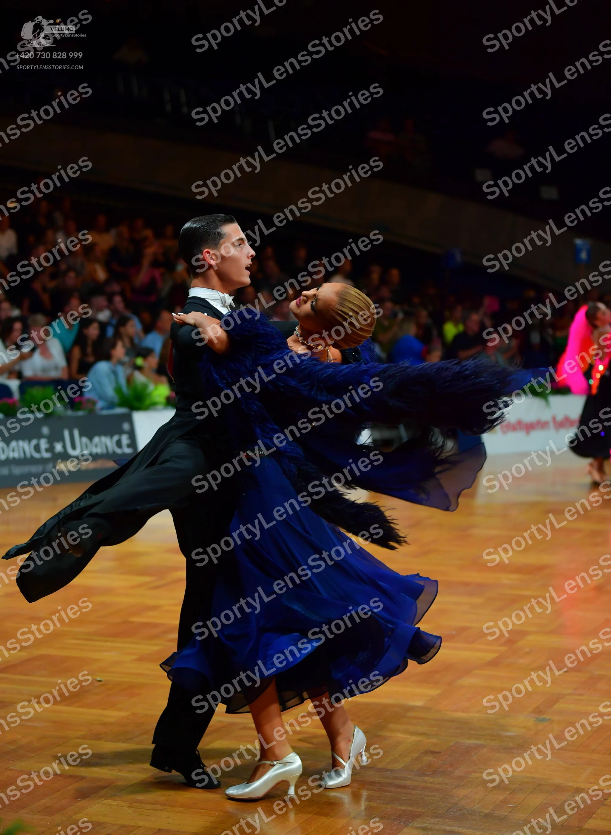 Dancesport competitor: Male dancer: black tailcoat, white shirt, and black bowtie