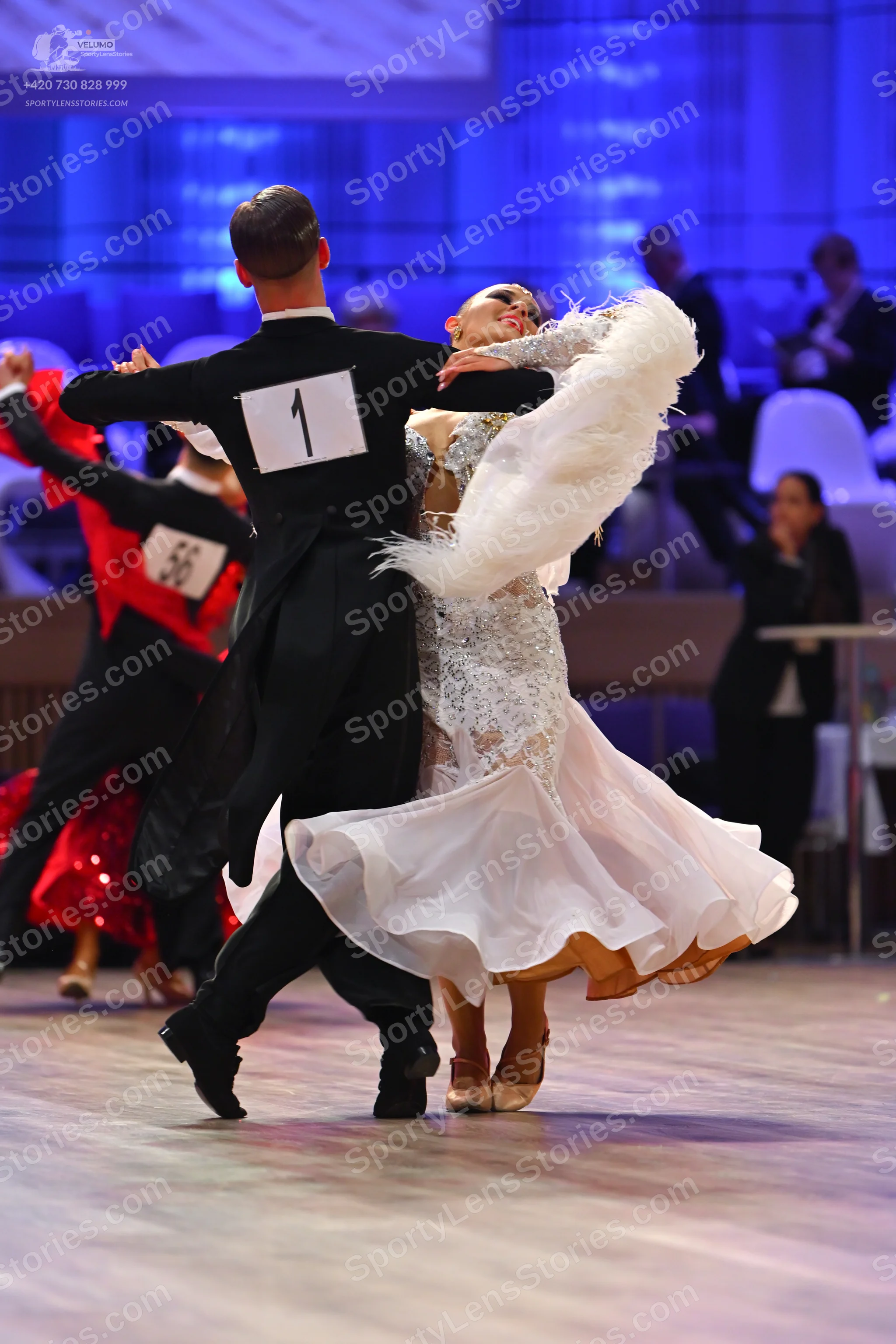 Dancesport competitor: Male dancer: black ballroom suit
